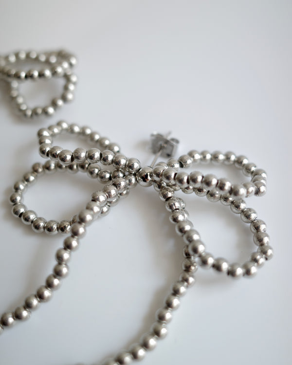 silver beads ribbon pierce